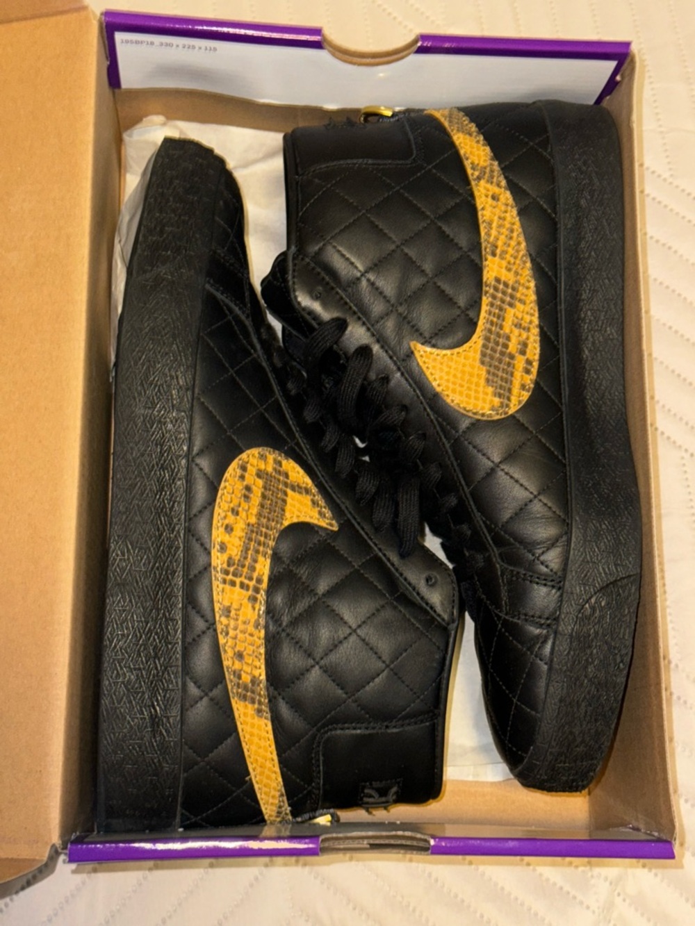 Supreme Nike Black Quilted High-Tops with Yellow Snakeskin Swoosh